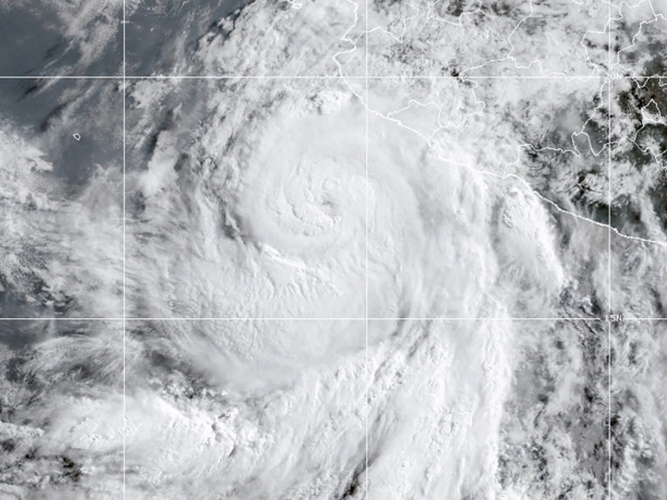 caption: A satellite image of Hurricane Flossie on July 1, 2025. Forecasters at the National Oceanic and Atmospheric Administration use data provided by the Department of Defense to track storms as they form.