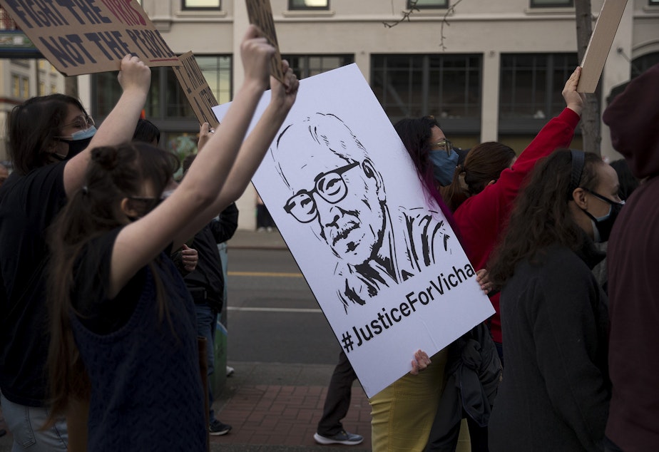 caption: A crowd marches along 5th Avenue South during the 'We Are Not Silent' march against anti-Asian hate and violence on Saturday, March 13, 2021, in Seattle. Several days of actions are planned by rally organizers in the Seattle area following recent attacks and violence against Asian American and Pacific Islander communities.