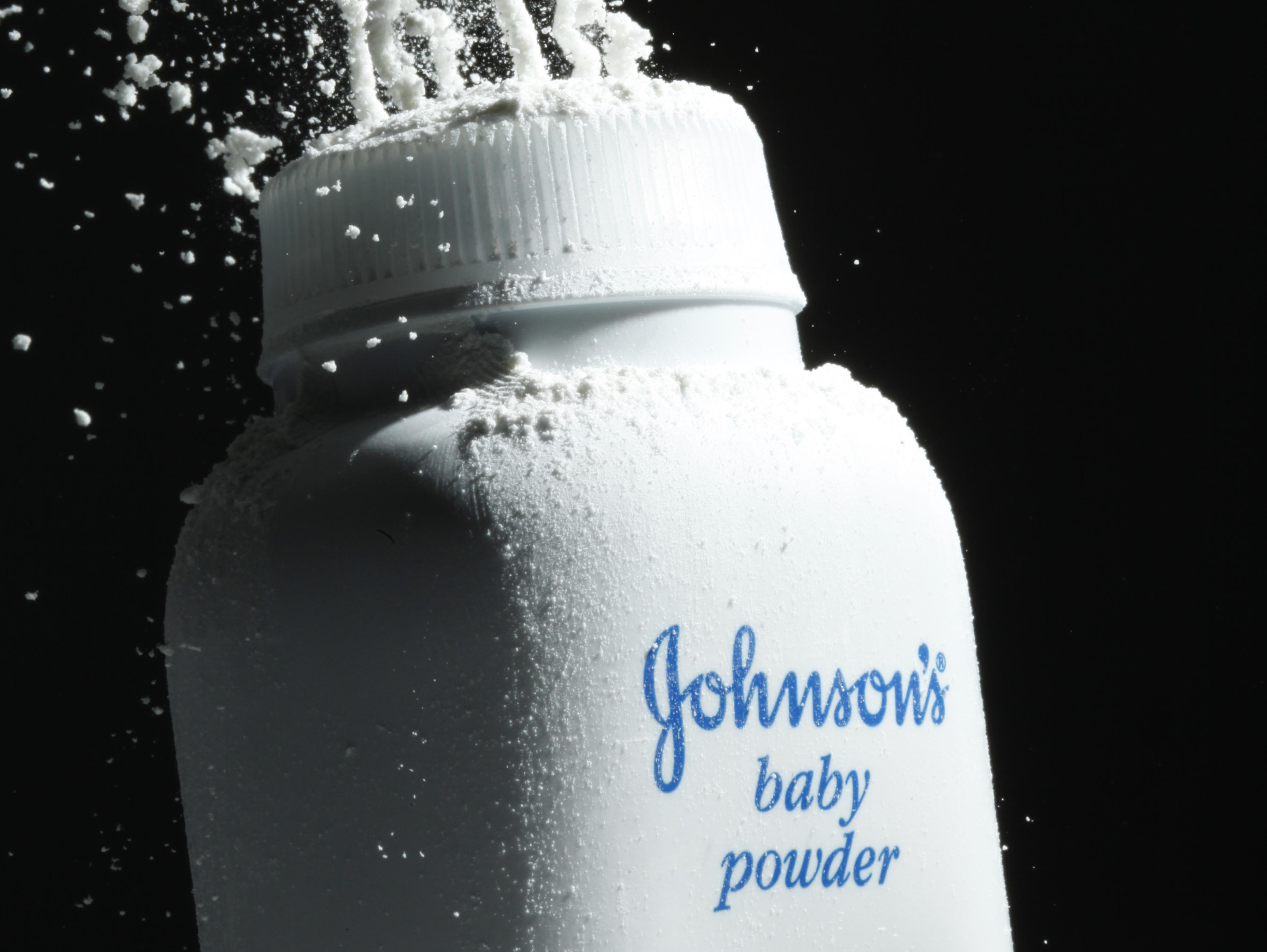 caption: In this file photo, Johnson's baby powder is squeezed from its container.