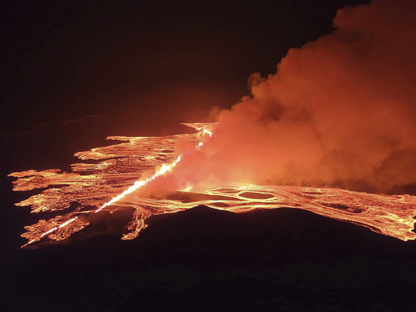 caption: This image from video provided by Iceland Civil Defense shows lava erupting from a volcano between Hagafell and Stóri-Skógfell, Iceland, on on Saturday, March 16, 2024.