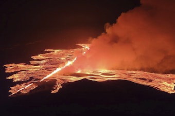 caption: This image from video provided by Iceland Civil Defense shows lava erupting from a volcano between Hagafell and Stóri-Skógfell, Iceland, on on Saturday, March 16, 2024.