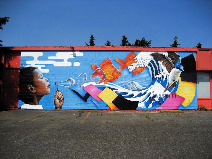 caption: A mural at the Pratt Fine Arts Center in the Central District of Seattle.