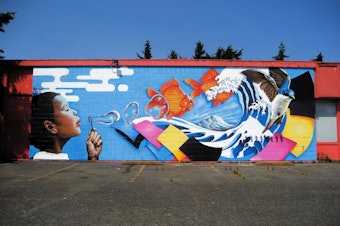 caption: A mural at the Pratt Fine Arts Center in the Central District of Seattle.