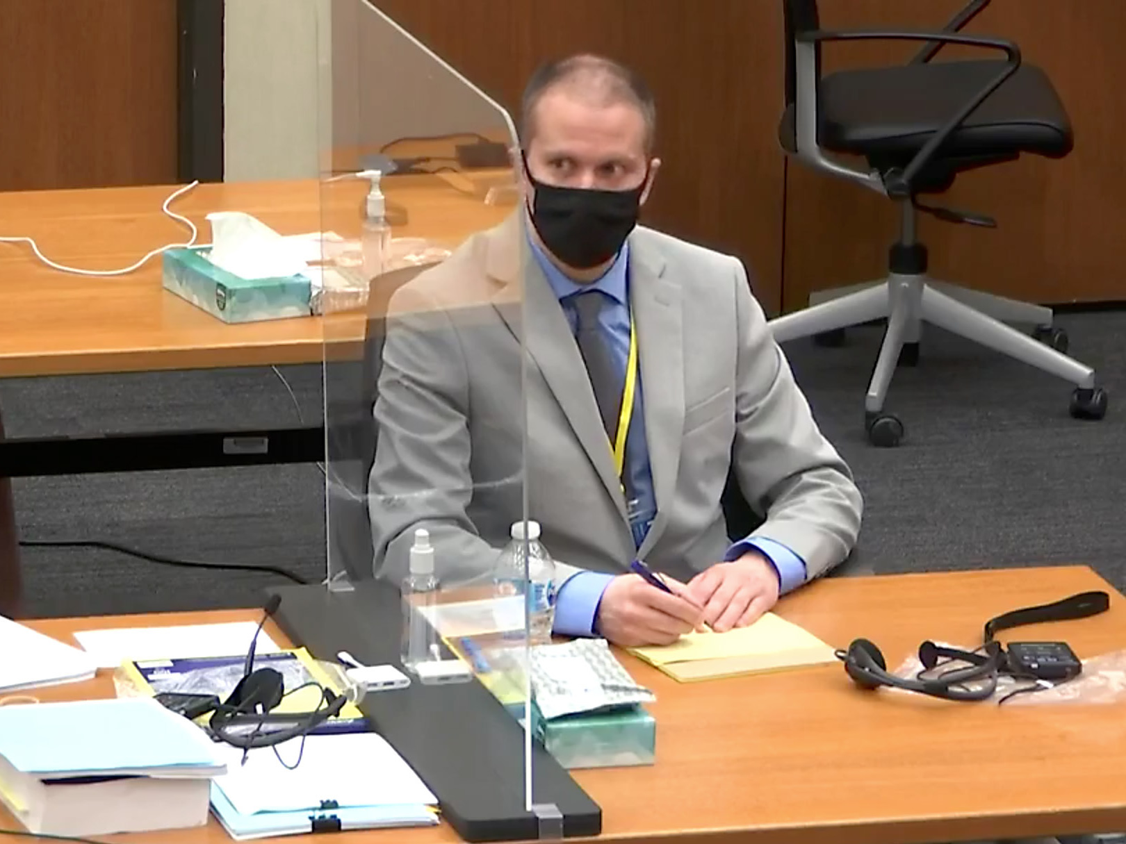 caption: A screenshot from MPR's live Facebook video feed of jury selection in trial of former Minneapolis police officer Derek Chauvin.