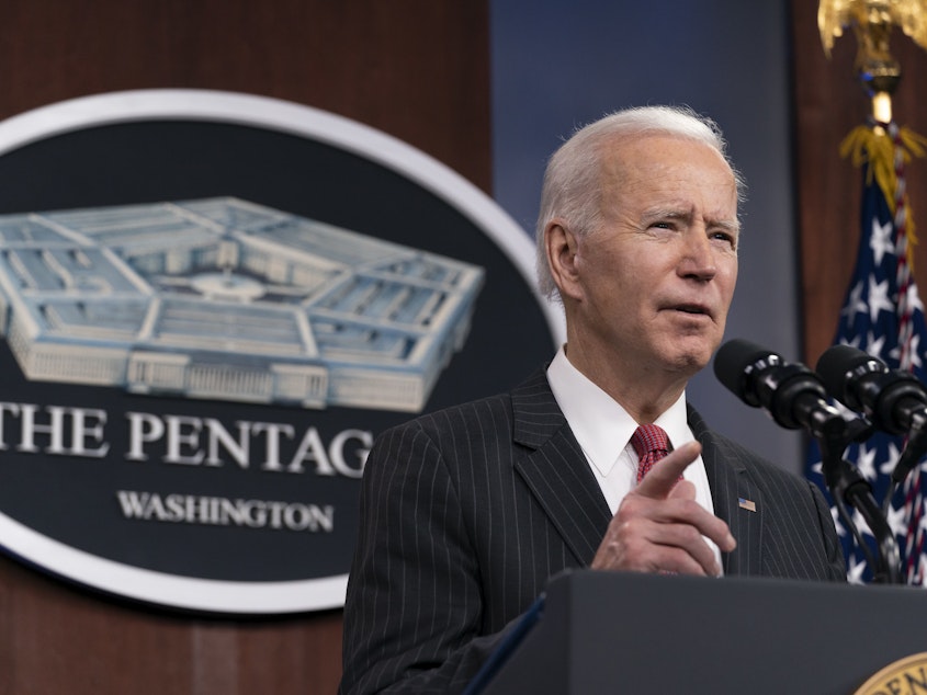 caption: President Biden speaks at the Pentagon on Feb. 10. On Wednesday, he will announce the withdrawal of U.S. troops from Afghanistan after nearly 20 years of war.