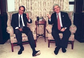 caption: Newt Gingrich, the incoming speaker of the House, meets with Dole, then Senate majority leader, on Capitol Hill on Jan. 3, 1995. The 104th Congress had a Republican majority in both chambers for the first time since 1954.