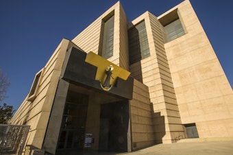 caption: The Archdiocese of Los Angeles has agreed to pay $8 million to a teenager who was sexually abused by a teacher when she was 15 years old. Pictured here, the Cathedral of Our Lady of the Angels, the headquarters for the archdiocese, in 2013.