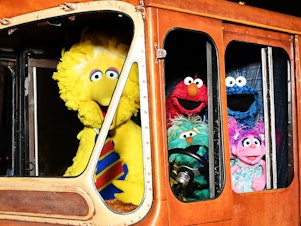 caption: <em>Sesame Street</em>'s Big Bird, Elmo, Cookie Monster, and Abby Cadabby attend HBO Premiere of Sesame Street's The Magical Wand Chase at the Metrograph in 2017 in New York City.