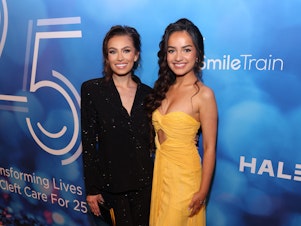 caption: Noelia Voigt (L) and UmaSofia Srivastava (R) attend a charity event in New York City on May 8, the week that they stepped down as Miss USA and Miss Teen USA.