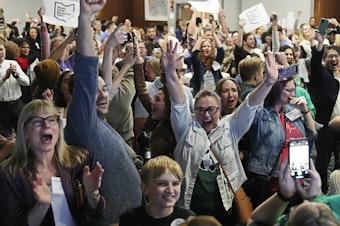 caption: Supporters for a pro-abortion ballot measure cheer as they watch election results come in on Tuesday in Columbus, Ohio.