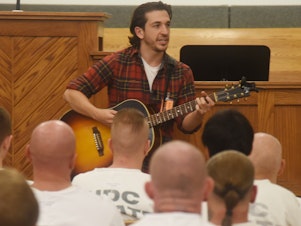 caption: Matt Butler performing at the Central Utah Correctional Facility.