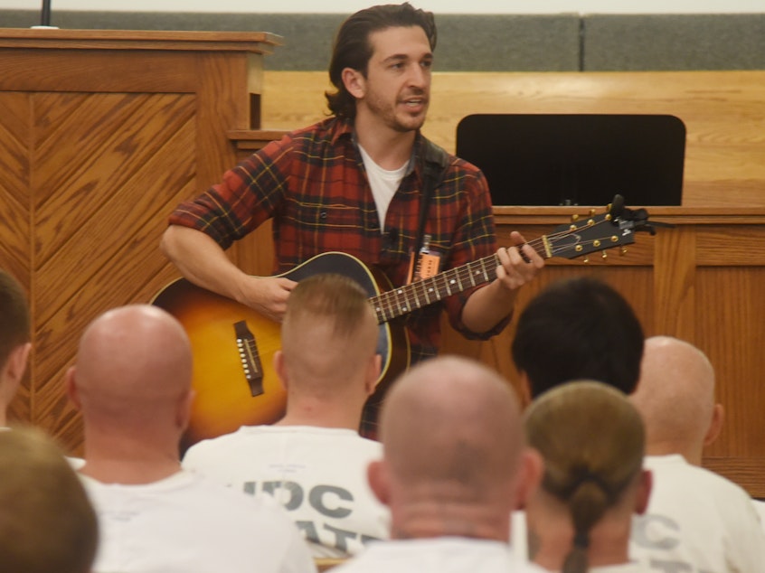 caption: Matt Butler performing at the Central Utah Correctional Facility.