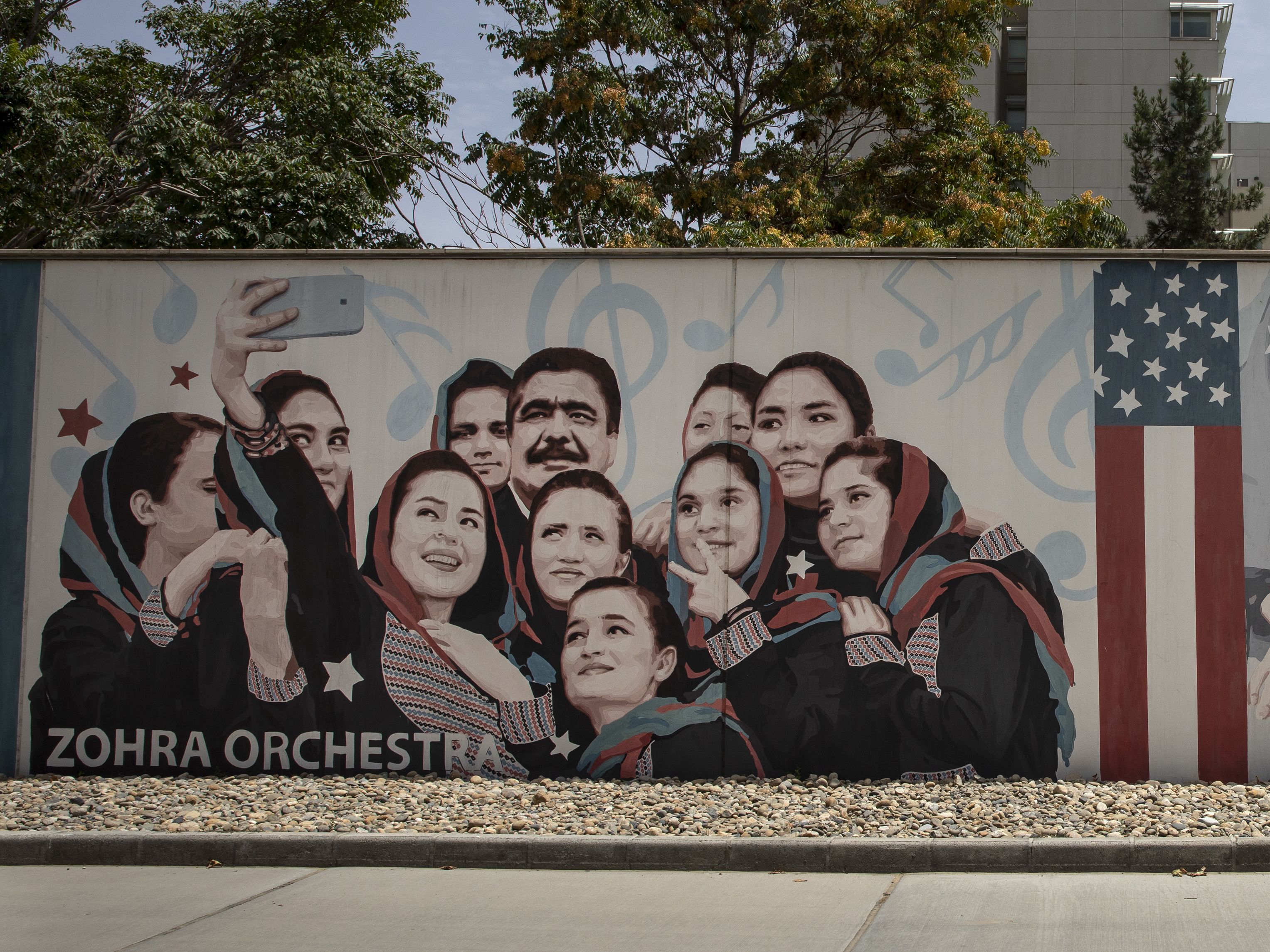 caption: Murals are seen along the walls at a quiet US embassy on July 30, 2021 in Kabul, Afghanistan.