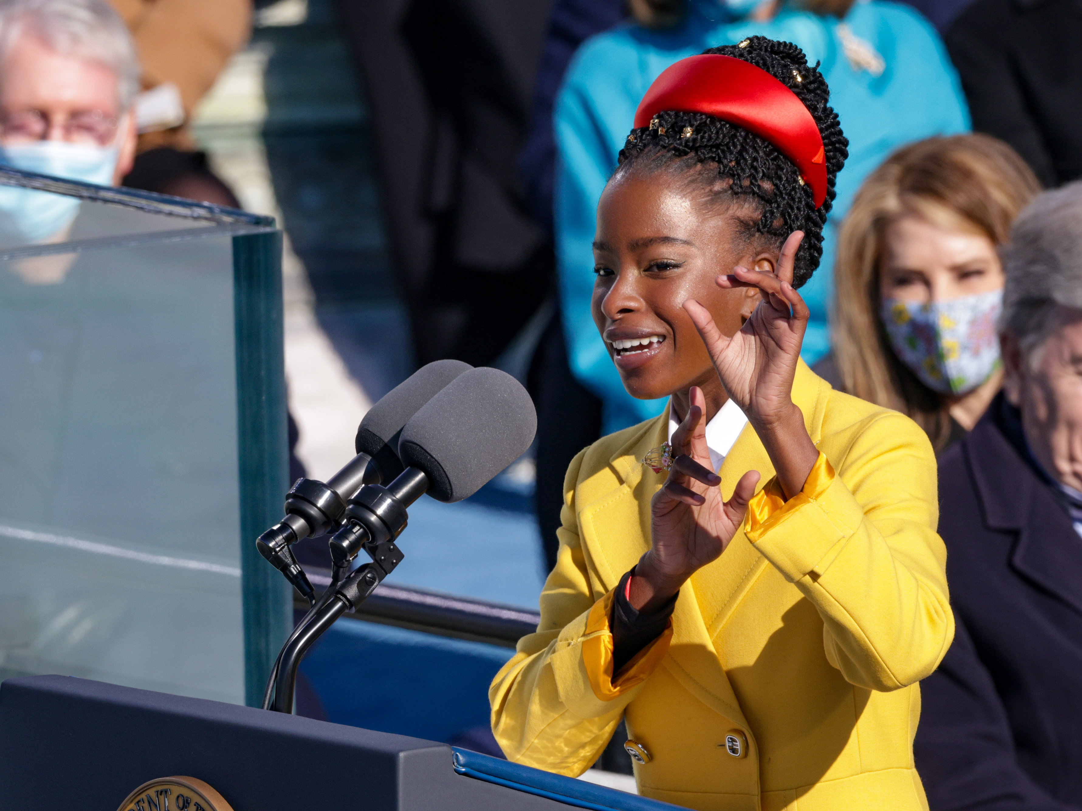 caption: Poet Amanda Gorman speaks at the inauguration of U.S. President Joe Biden on the West Front of the U.S. Capitol on January 20.