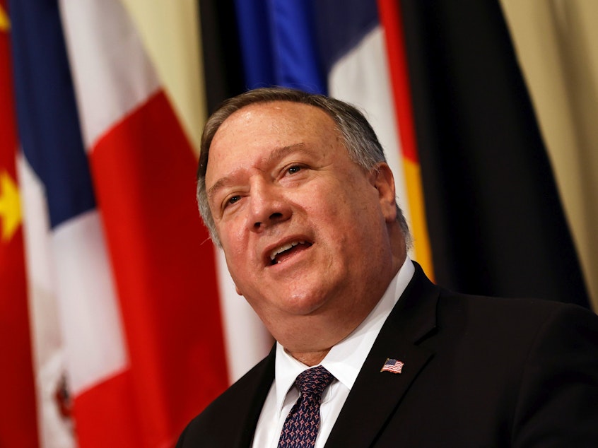 caption: Secretary of State Mike Pompeo speaks to reporters Thursday after meeting with members of the U.N. Security Council and calling for the restoration of sanctions against Iran.