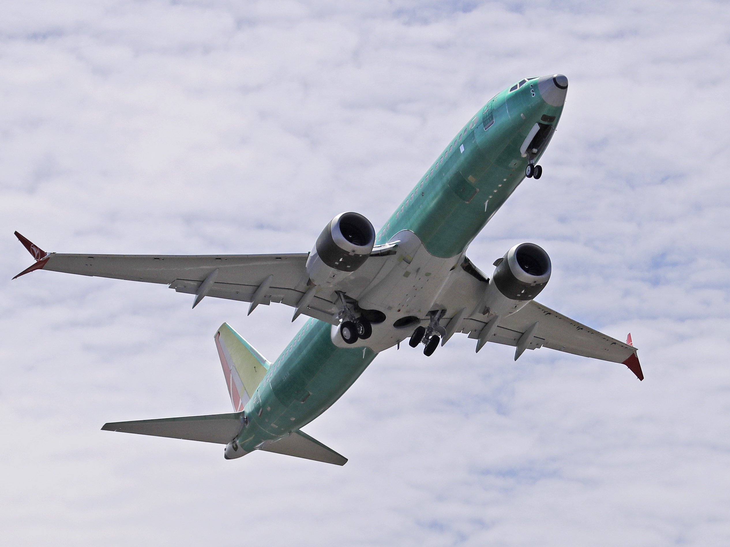 caption: A Boeing 737 MAX 8 jetliner being built for Turkish Airlines takes off on a test flight, Wednesday, May 8, 2019, in Renton, Wash. 