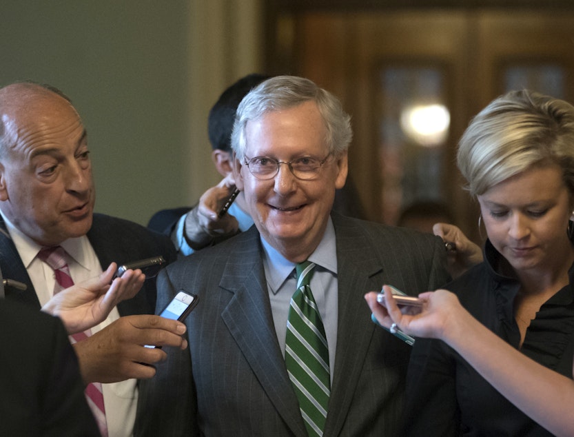 caption: FILE: Senate Majority leader Mitch McConnell smiles as he leaves the chamber after announcing the release of the Republicans' health care bill Thursday, June 22, 2017.