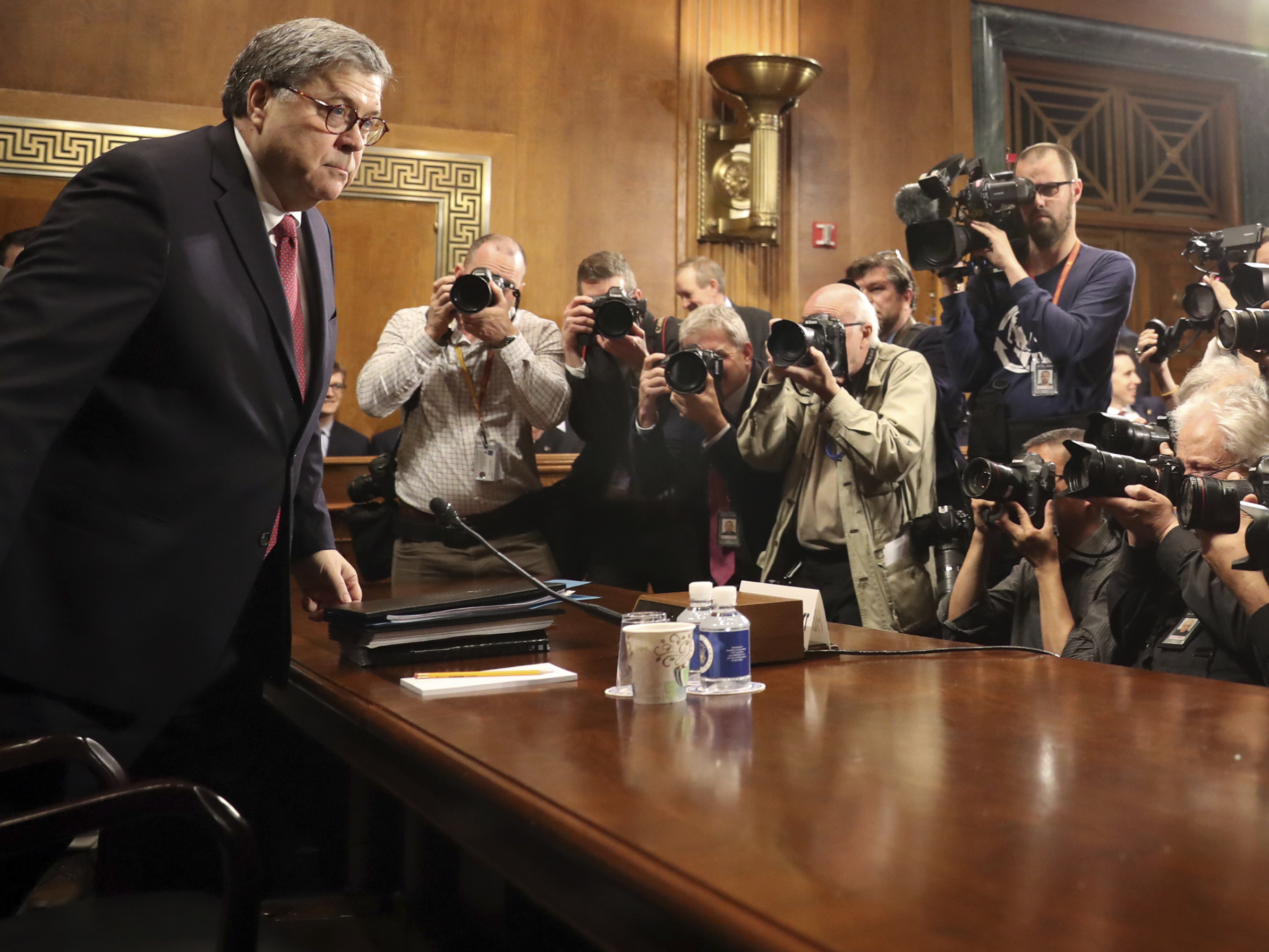 caption: Attorney General William Barr arrived to testify during a Senate Judiciary Committee hearing on Capitol Hill. Some Democrats are calling on him to step down.