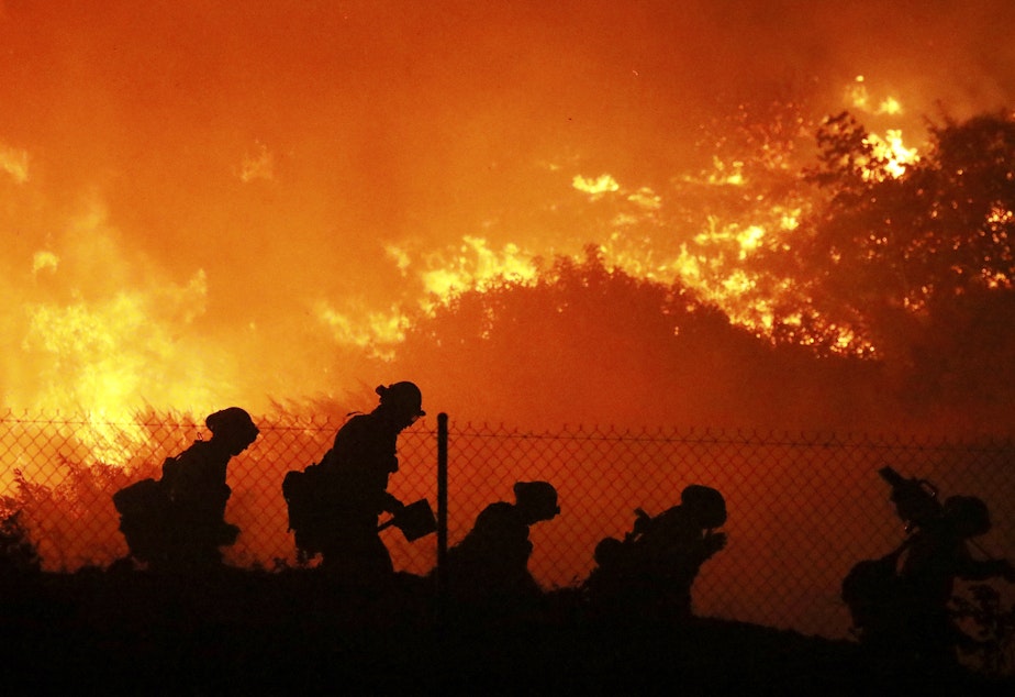 caption: The Trump administration has formally notified the United Nations that it is withdrawing from the Paris climate agreement. The move comes as climate change drives more frequent and severe wildfires, hurricanes and other hazards.