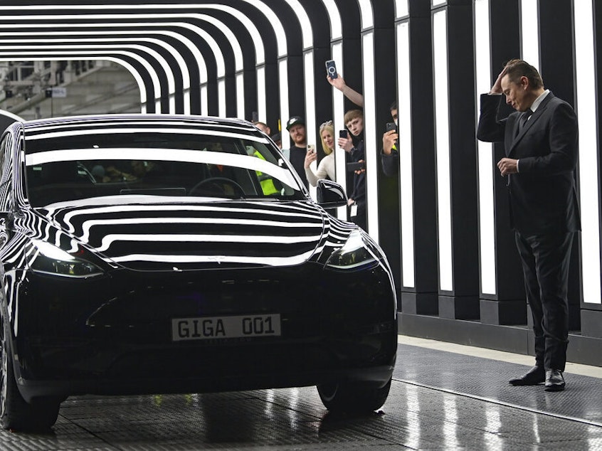 caption: Tesla CEO Elon Musk attends the opening of Tesla factory Berlin-Brandenburg in Gruenheide, Germany on March 22.