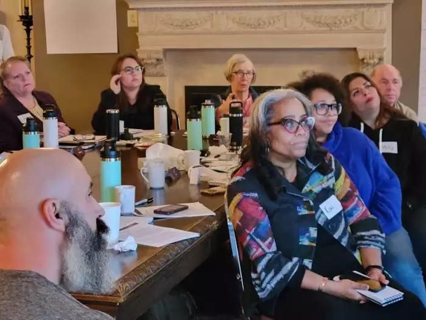 caption: Without knowing one another, 14 people, including Kai Gardner Mishlove, gathered from across Wisconsin to discuss all things abortion for three days in Madison.
