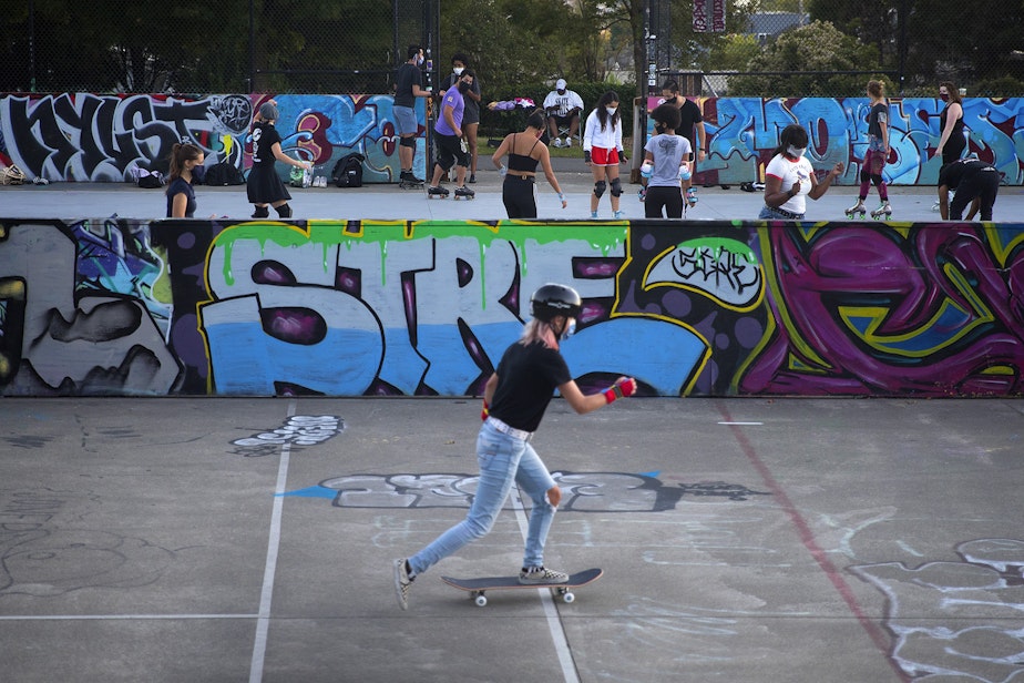 caption: A Roll Around Seatown skate meet up takes place on Monday, September 28, 2020, at the Judkins Park sports courts in Seattle. 