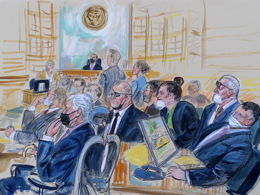 caption: This artist sketch depicts the trial of Oath Keepers leader Stewart Rhodes and four others charged with seditious conspiracy in the Jan. 6, 2021, U.S. Capitol attack.