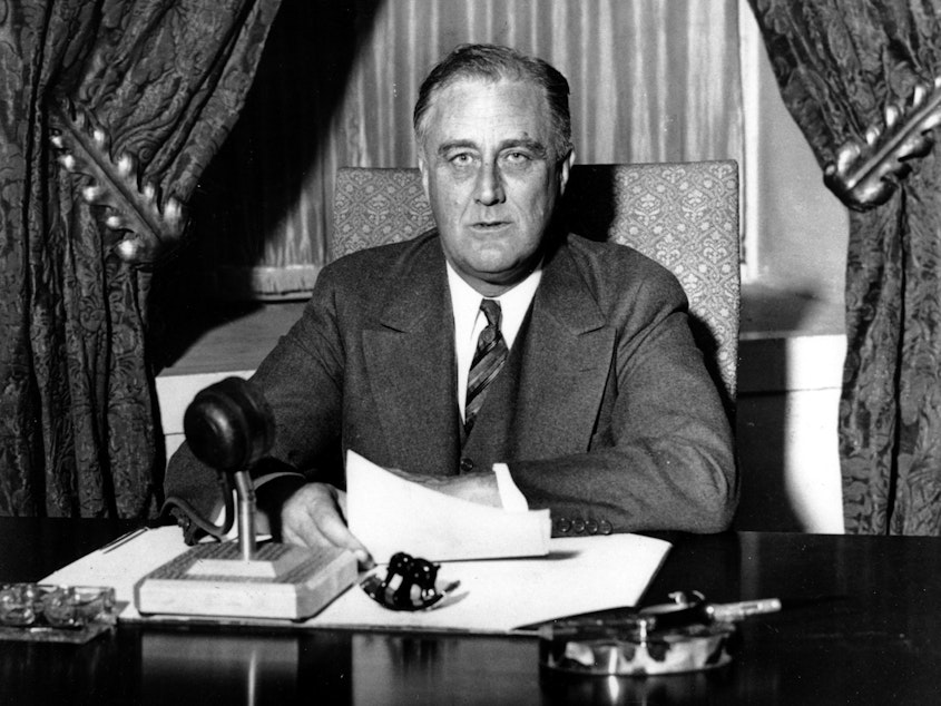 caption: This photo was taken moments before President Franklin D. Roosevelt began his historic "Fireside Chat" to the American people on March 12, 1933. President Biden is reviving the practice, used by many modern presidents but ditched by Donald Trump, of directly addressing the public through a weekly address.