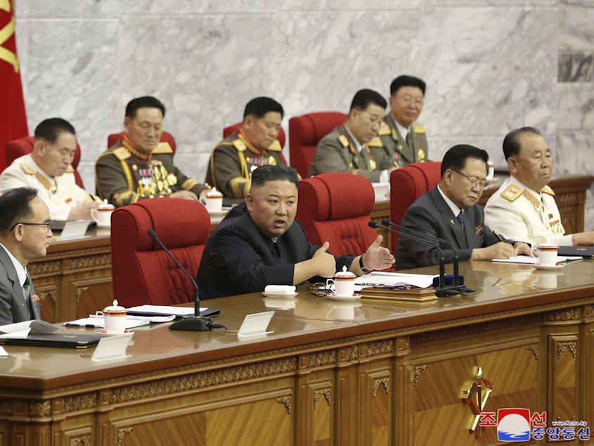 caption: In this photo provided by the North Korean government, North Korean leader Kim Jong Un, center, speaks during a Workers' Party meeting Thursday in Pyongyang. Kim ordered his government to be fully prepared for confrontation with the Biden administration, state media reported Friday, days after the U.S. and other major powers urged the North to abandon its nuclear program and return to talks.