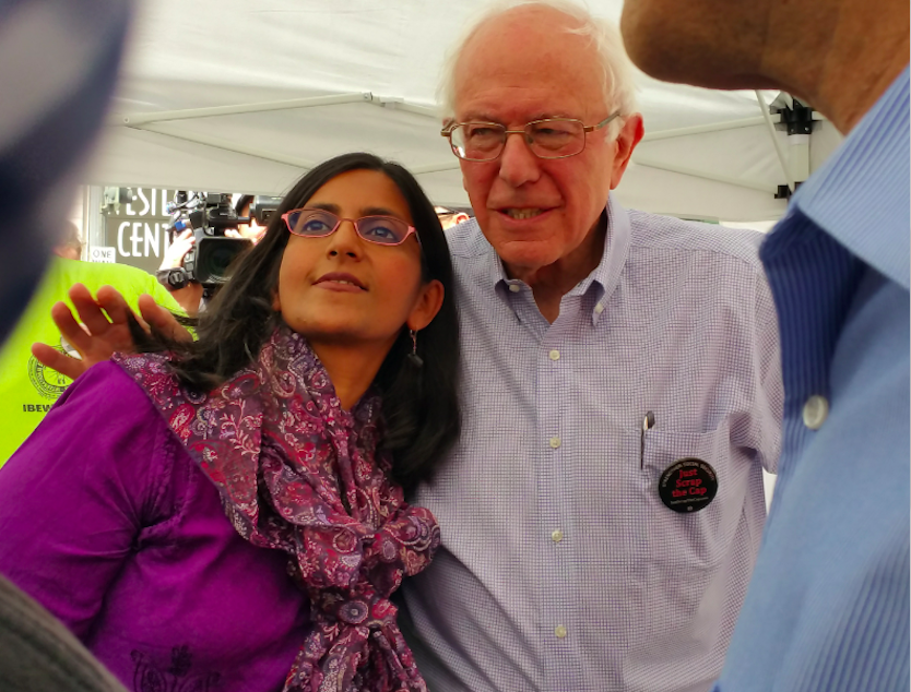 caption: Bernie Sanders, senator from Vermont and presidential candidate, and Councilmember Kshama Sawant at a rally held at Westlake Center in 2015.
