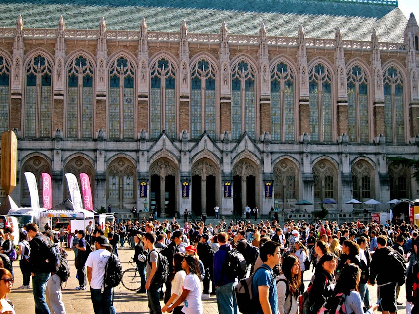 caption: A large group of students in the University of Washington's Red Square.