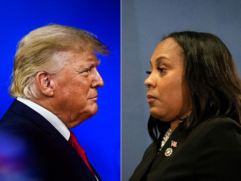 caption: Former President Donald Trump is facing charges stemming from an investigation into his efforts to overturn the 2020 presidential election results in Georgia, led by Fulton County District Attorney Fani Willis.
