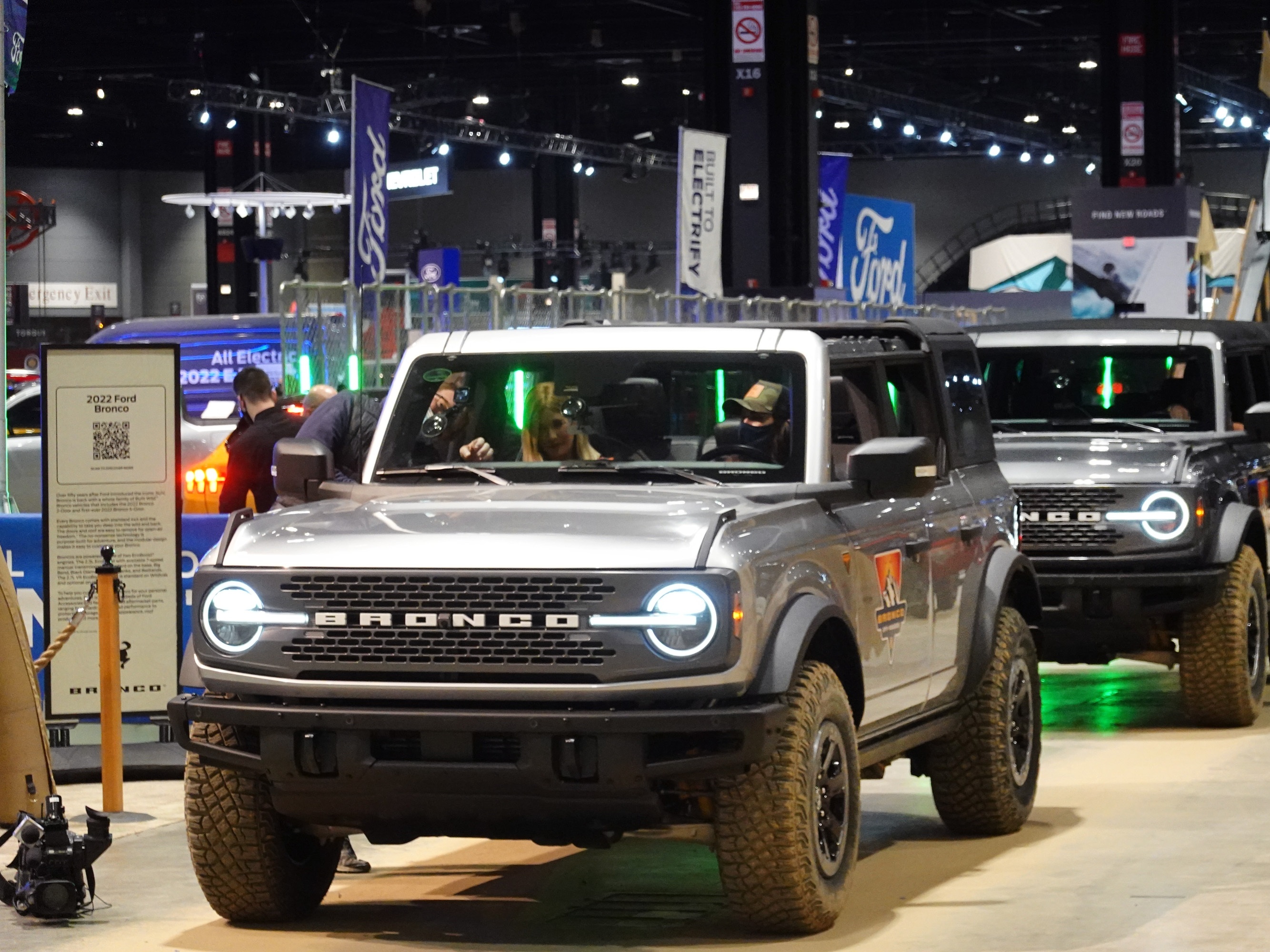 caption: Ford offers rides in the 2022 Bronco Sport on a test track at the Chicago Auto Show on February 10, 2022. The vehicle is part of a recall for a potential battery defect.
