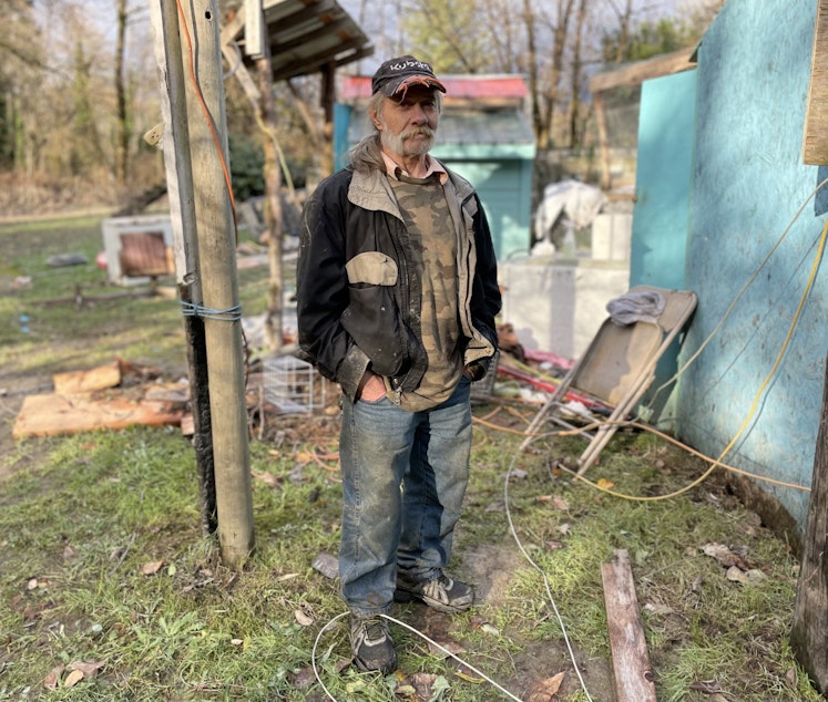 caption: Bert Kerns in Hamilton, Washington after the flood of November 2021.