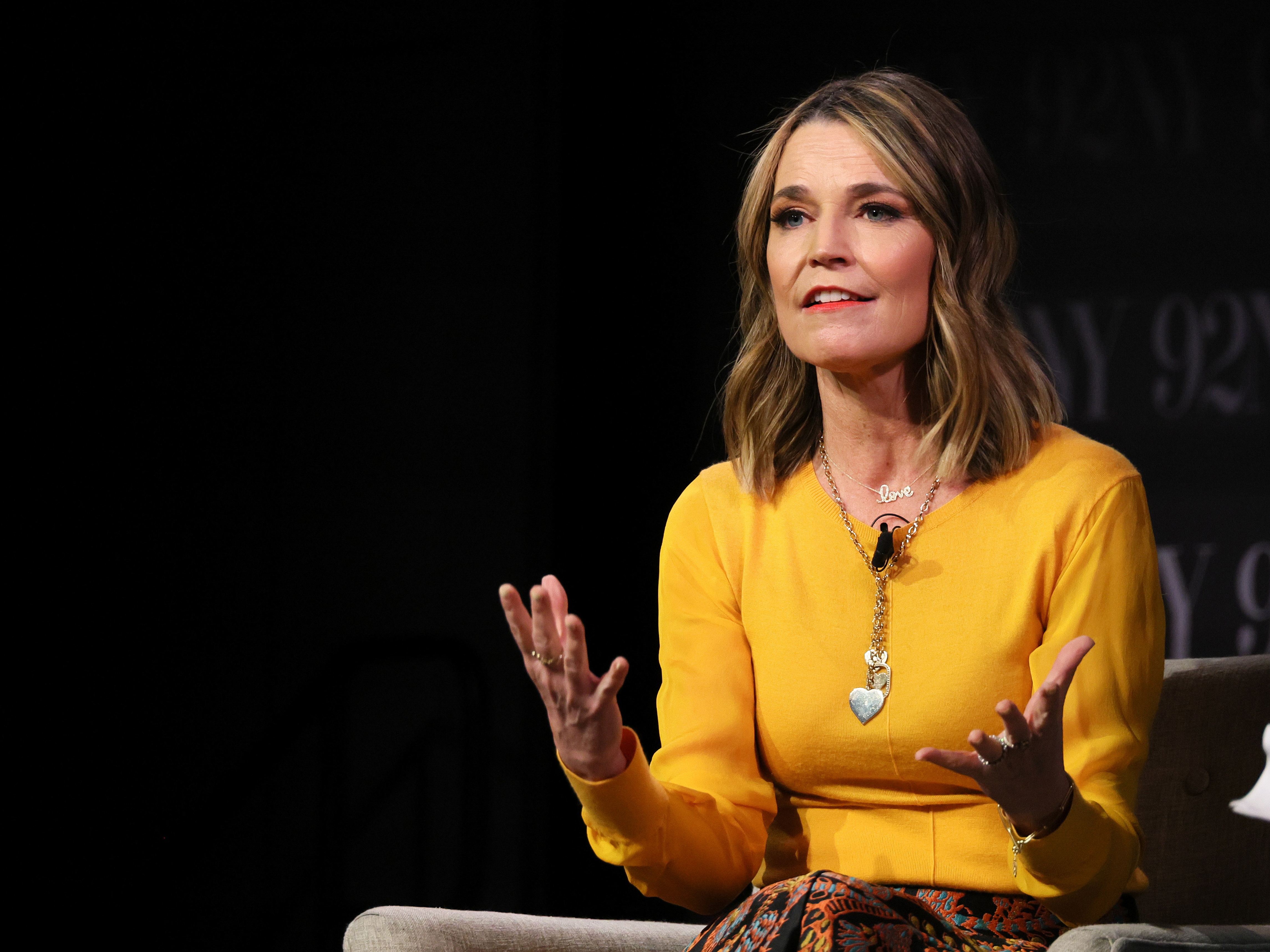 caption: Savannah Guthrie speaks onstage during an event with Hoda Kotb at the 92nd Street Y on Feb. 22 in New York.