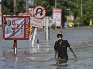 caption: Heavy rain caused floods in northeastern Thailand in October 2022. Millions of people around the world would benefit from more timely and accurate warnings about climate-driven extreme weather such as floods and heat waves. A new United Nations initiative plans to spend $3.1 billion on such early warning systems.
