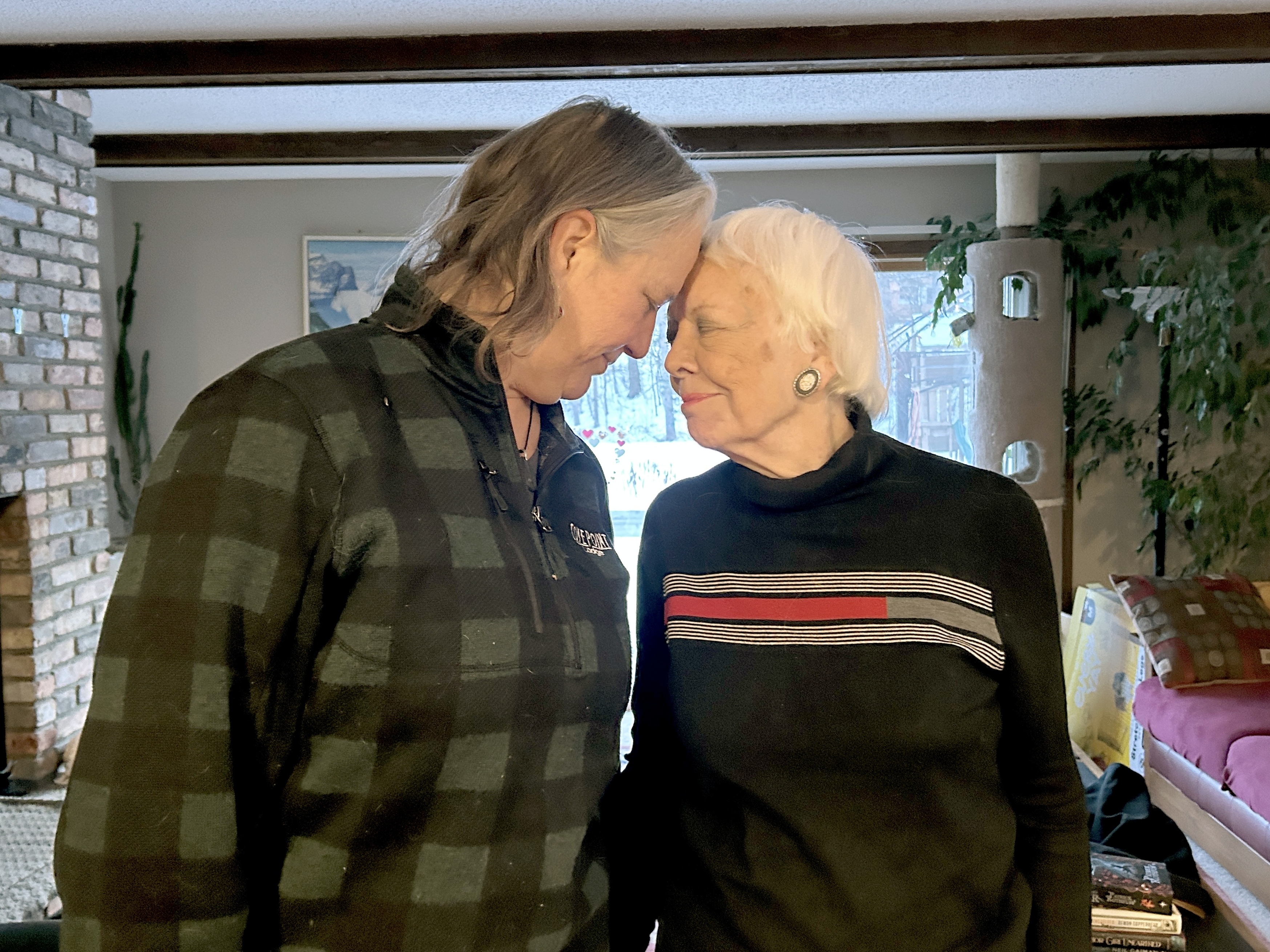 caption: Jacqueline Hamilton (left) and her mother, Jan Stubbs, at Hamilton's home in West St. Paul, Minnesota.