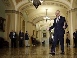 caption: Senate Majority Leader Charles Schumer  arrives for a news conference following the weekly Senate Democratic policy luncheon at the U.S. Capitol on March 29, 2022.