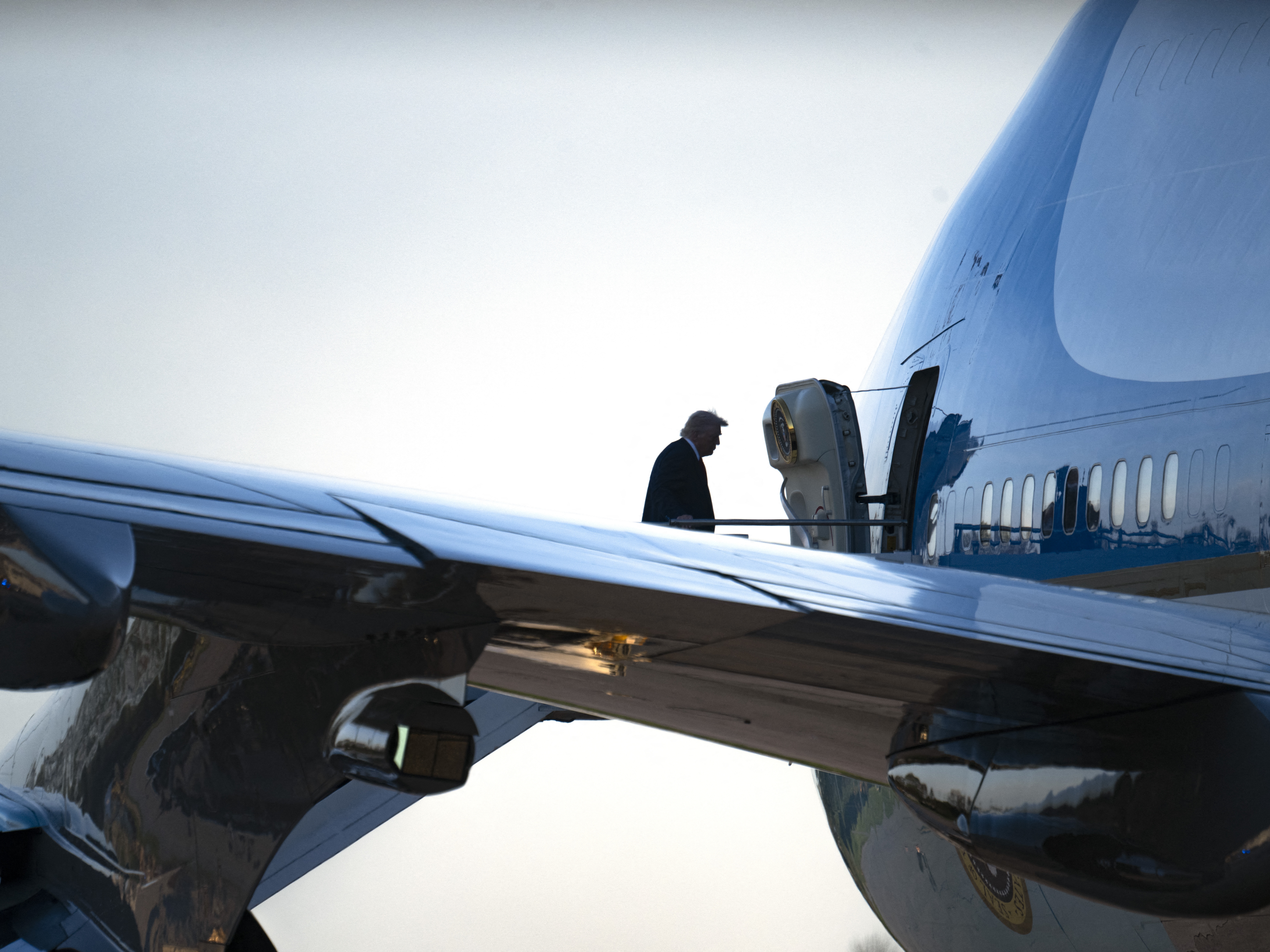 caption: President Trump, seen here boarding Air Force One on March 21, says Qatar has offered to give the Defense Department a new presidential jet.