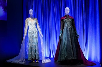 caption: <strong>Can't Let It Go:</strong> Two looks from Disney's <em>Frozen</em>, by Christopher Oram, including Elsa's Ice Dress