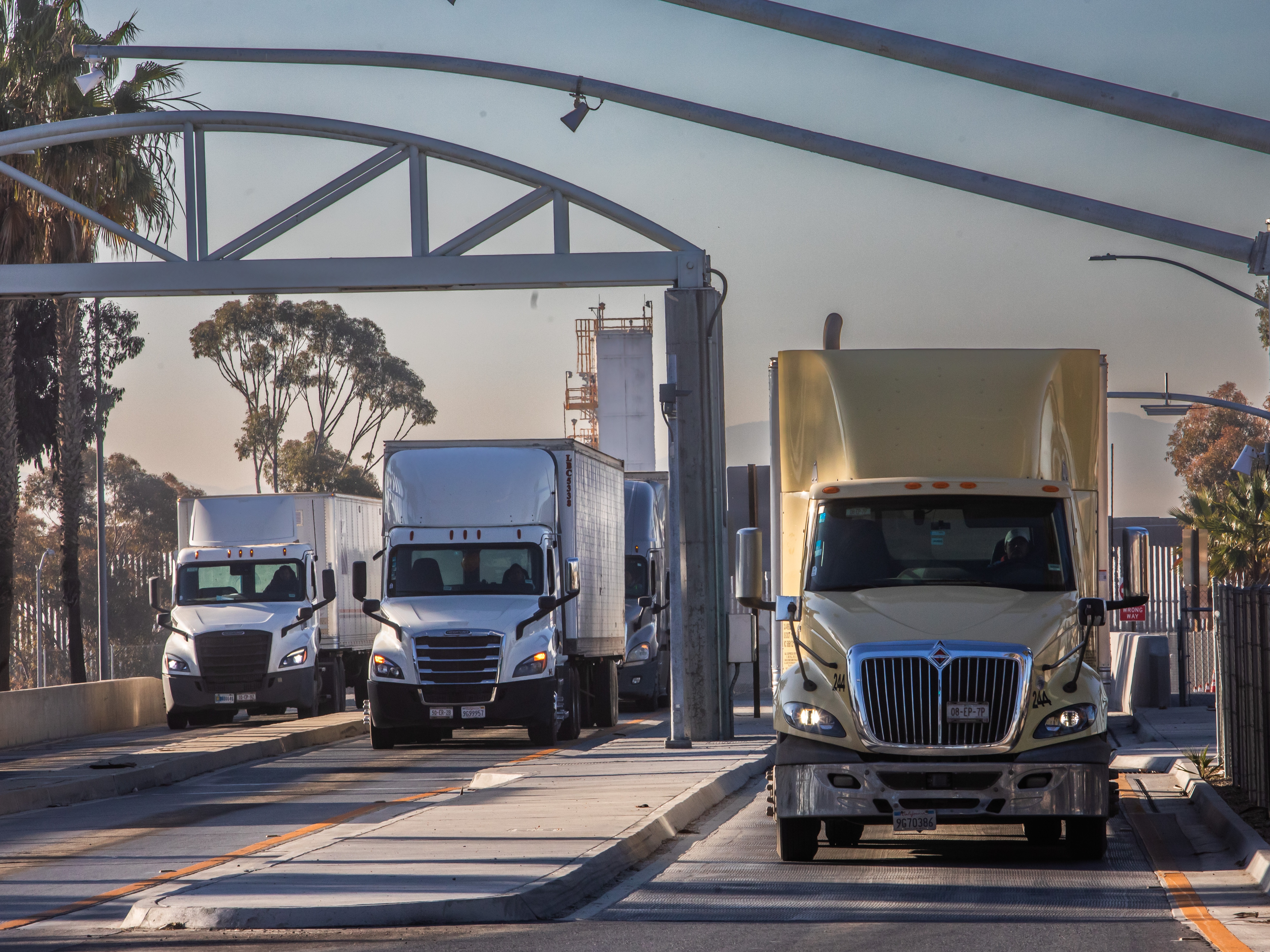 caption: President Trump imposed tariffs of up to 25% today on imports from Mexico and Canada, two of the United States' biggest trading partners — while increasing tariffs on China.