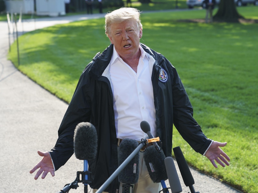 caption: President Trump says Brett Kavanaugh has an "unblemished" record, but says he wants to hear from Kavanaugh's accuser, Christine Blasey Ford, who says Kavanaugh sexually assaulted her.