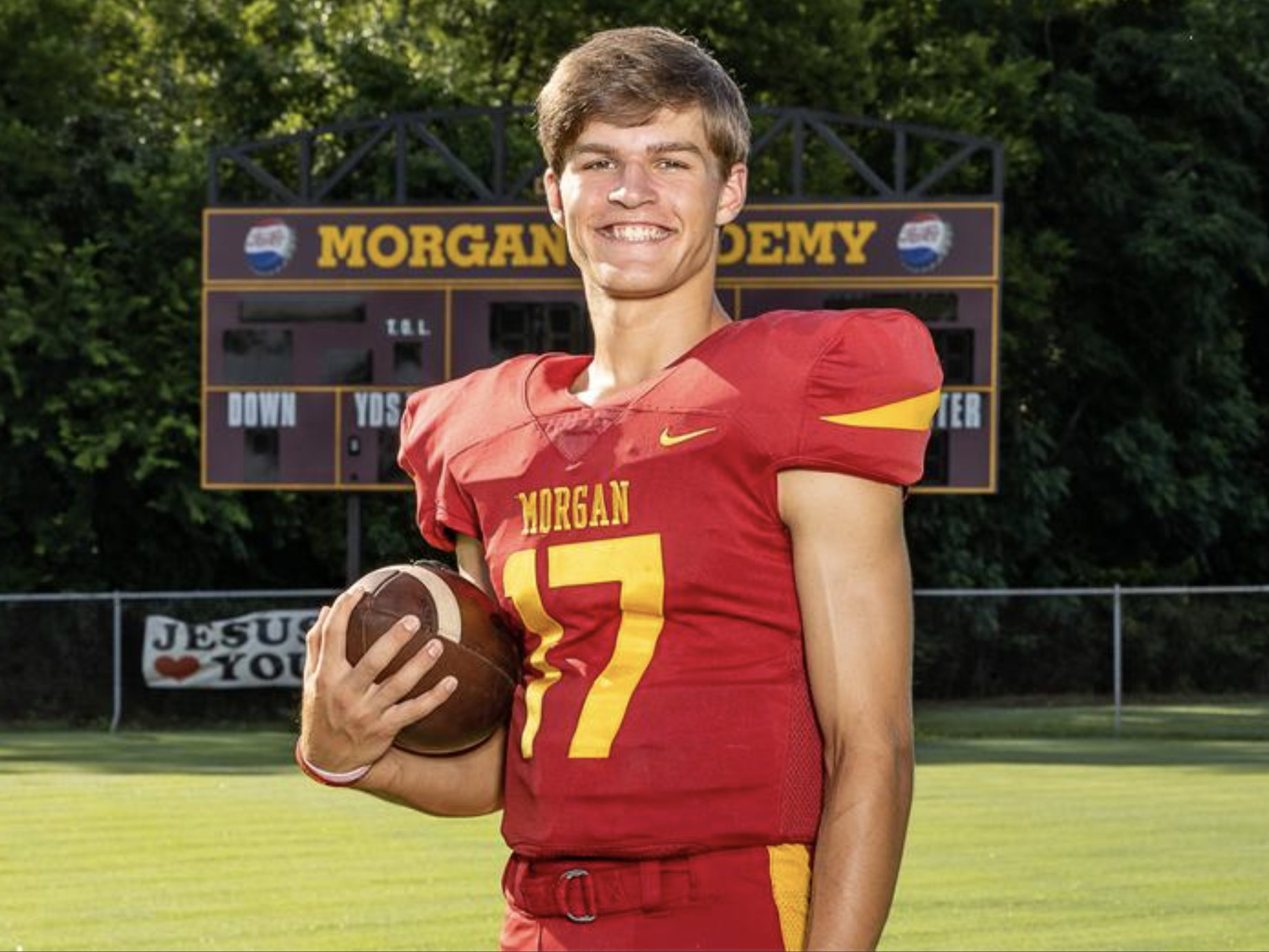 caption: A team photo shows Caden Tellier, the quarterback at Morgan Academy in Selma, Ala., who died over the weekend after a brain injury in a game. The school shared photos of Tellier as it <a href="https://www.facebook.com/johntmorganacademy">called for donations</a> to support his family.