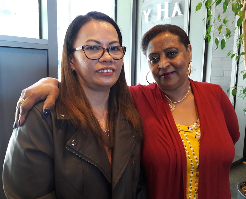 caption: Hotel workers Liza Cruz, left and Lula Haile, right. 