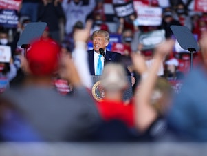 caption: President Trump speaks during a campaign rally at Harrisburg International Airport in Middletown, Pa., on Sept. 26.