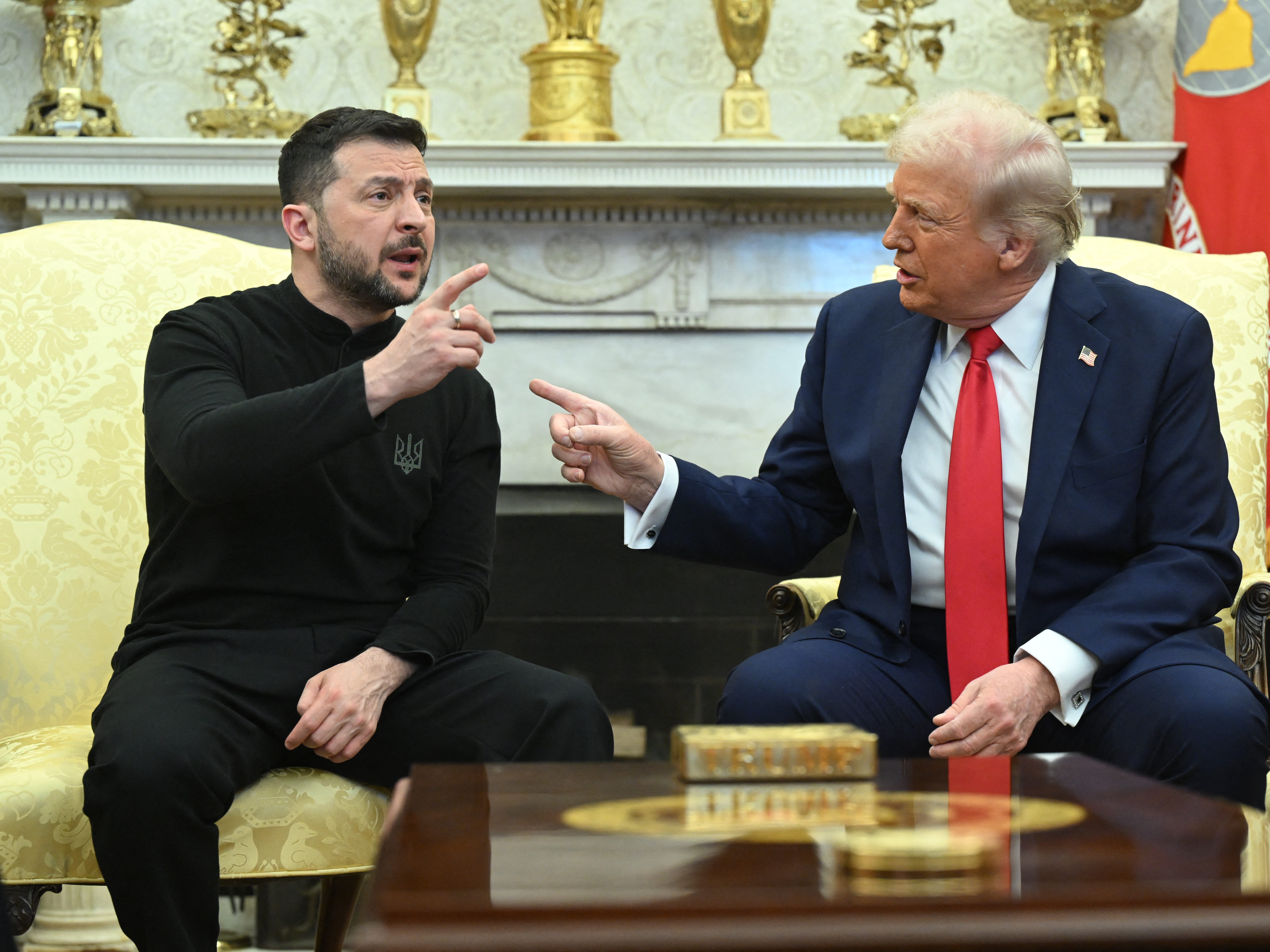 caption: President Trump and Ukrainian President Volodymyr Zelenskyy meet in the Oval Office of the White House in Washington, D.C., Friday.