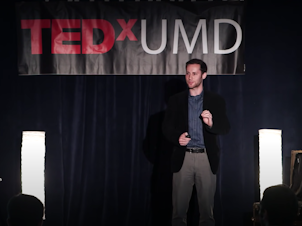 Dylan Selterman on the TEDx stage.