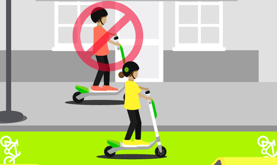 caption: A screenshot from the Lime app. On startup it tells you not to ride the scooters on sidewalks.