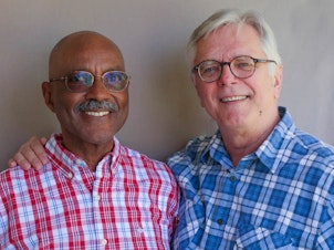 caption: At StoryCorps in Palm Springs, Calif., David Wilson (left) and his husband Robert Compton talk about how, as a same-sex couple, their treatment by others has changed since they were legally married in 2004.