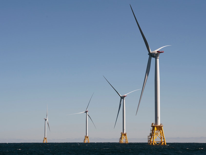 caption: The Biden administration is opening the West Coast to offshore wind. Companies have largely focused on the East Coast, such as this wind farm off Block Island, R.I.